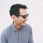 young-man-smiling-with-sunglasses-min-min